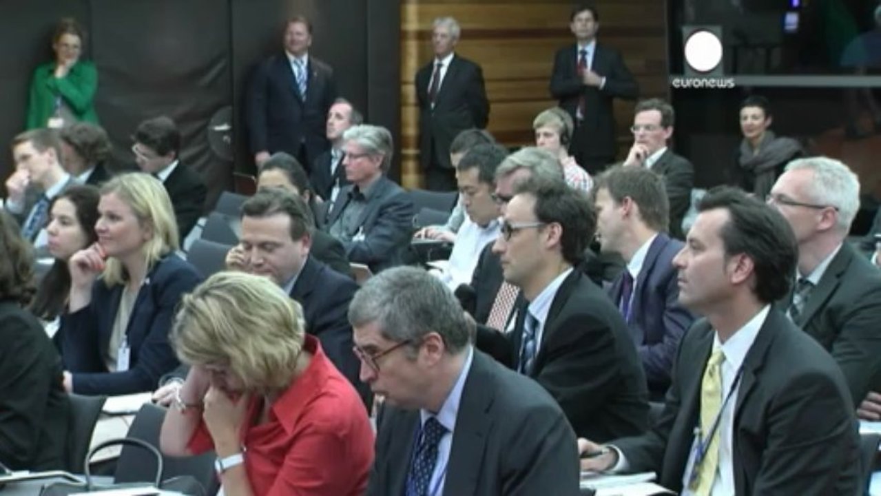 ECB commits to record low rates