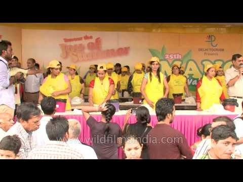 Mango eating competition for women draws huge crowd