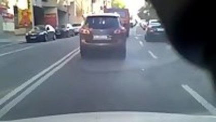 Motorcyclist Crashes Into Open Door