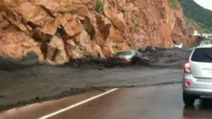 Car swept away by flash floods in Colorado