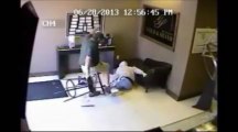 Store owner knocks out robber with a baseball bat!