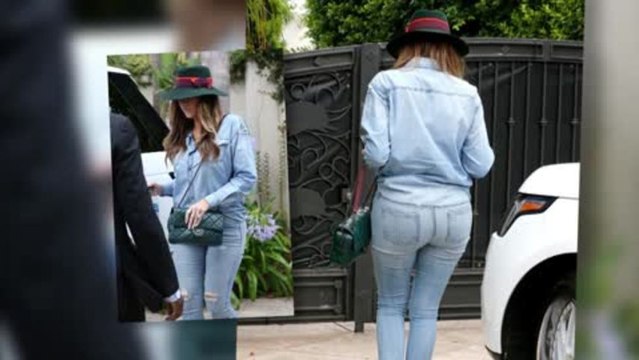 Khloe Kardashian Looks Somber in a Tight Double Denim Outfit
