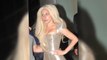 Lady Gaga Promotes Her New Album in Gold Dress