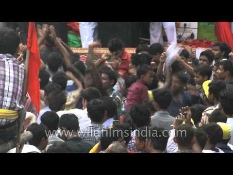 Thousands of devotees in front of chariots during 'Rath-yatra' in Delhi