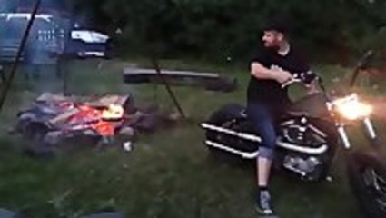 Feeding a Fire With a Motorcycle