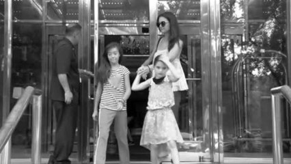 Un photographe traite Suri Cruise d'enfant gâtée