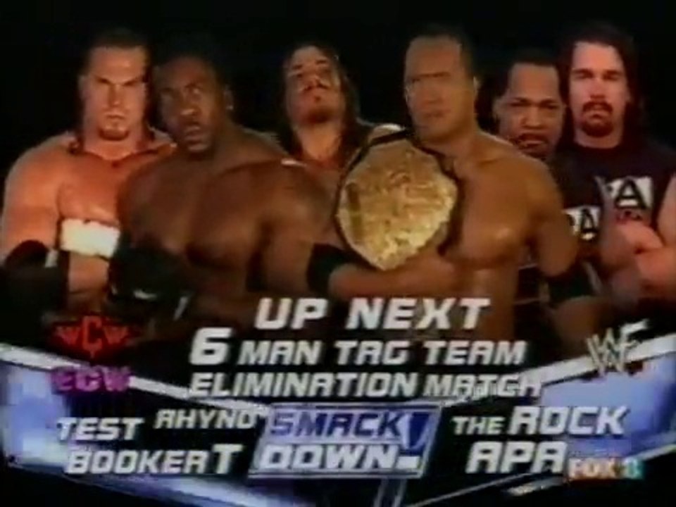 The Rock & A.P.A. vs. Booker T & Test & Rhyno w/Shane McMahon