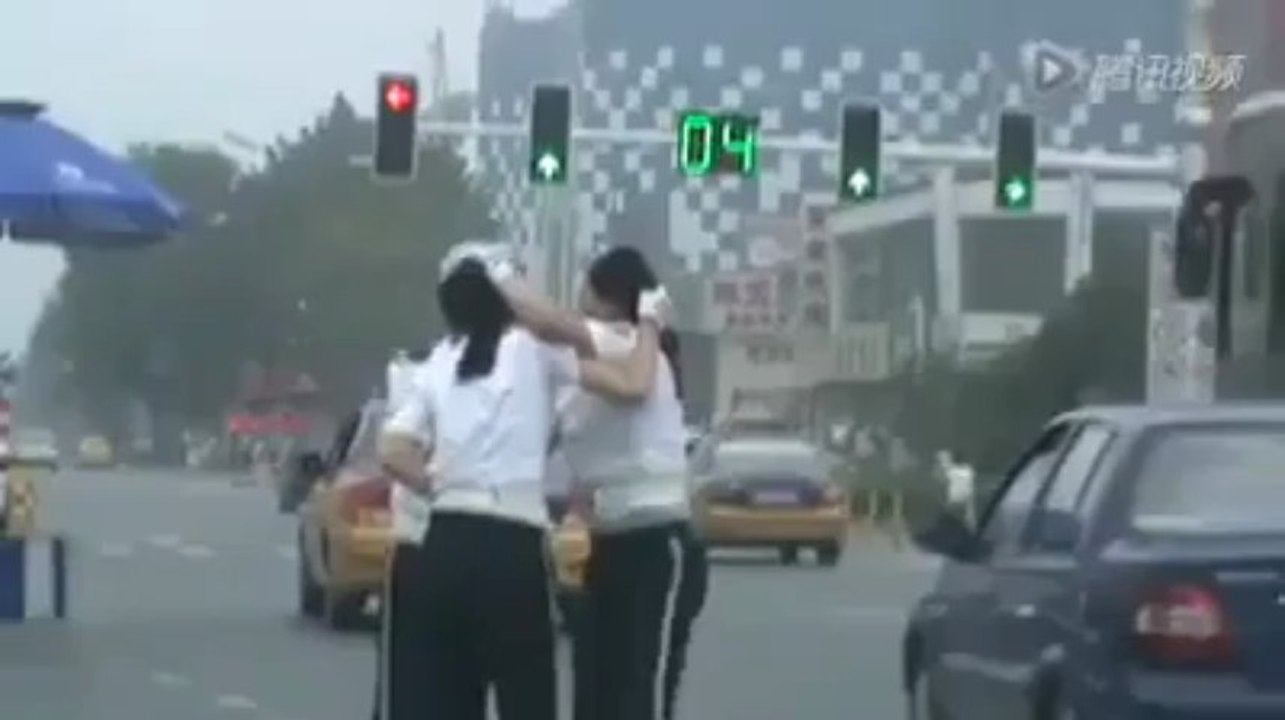 female police officer and colleague fight on the job