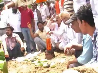 Indian people protest against congress government for hike petrol price