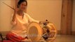 Instructor Park Eun Ha demonstrates drum techniques