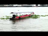 Longtail boat on the Chao Phraya river which flows through Bangkok