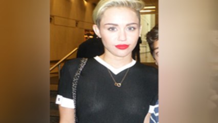 Miley Cyrus Caught Braless