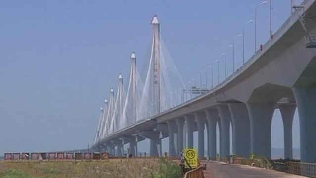 China opens world's longest cable-stayed bridge