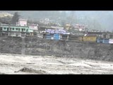A temple submerged in flooded river Ganga due to heavy rains in Uttarkashi