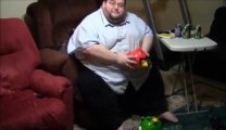 Fat guy playing Angry Birds