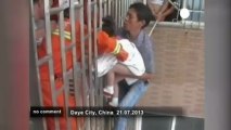 Child freed after being trapped in window... - no comment