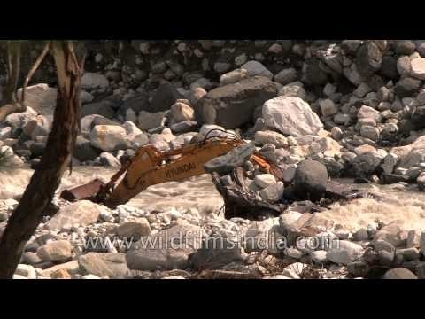 Iron, Bulldozers and junk on the riverbank: Devastated Guptkashi