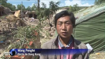Séisme en Chine: le désespoir de parents de victimes