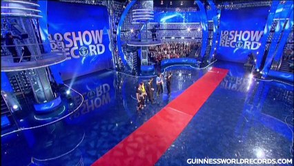 Fastest 20 m duck walk carrying 120 kg - Guinness World Records Classics