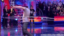 Giant hula hoop, most rotations in a minute - Guinness World Records Classics
