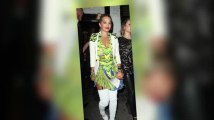 Rita Ora Shows Off Her Legs in Thigh High Boots and Suspenders