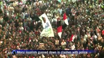 Dozens killed in Egypt as clashes erupt at Morsi rally