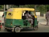 CNG auto rickshaws outside the Hauz Khas metro station