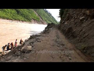 Narrow and dangerous road along river Mandakini in Garhwal
