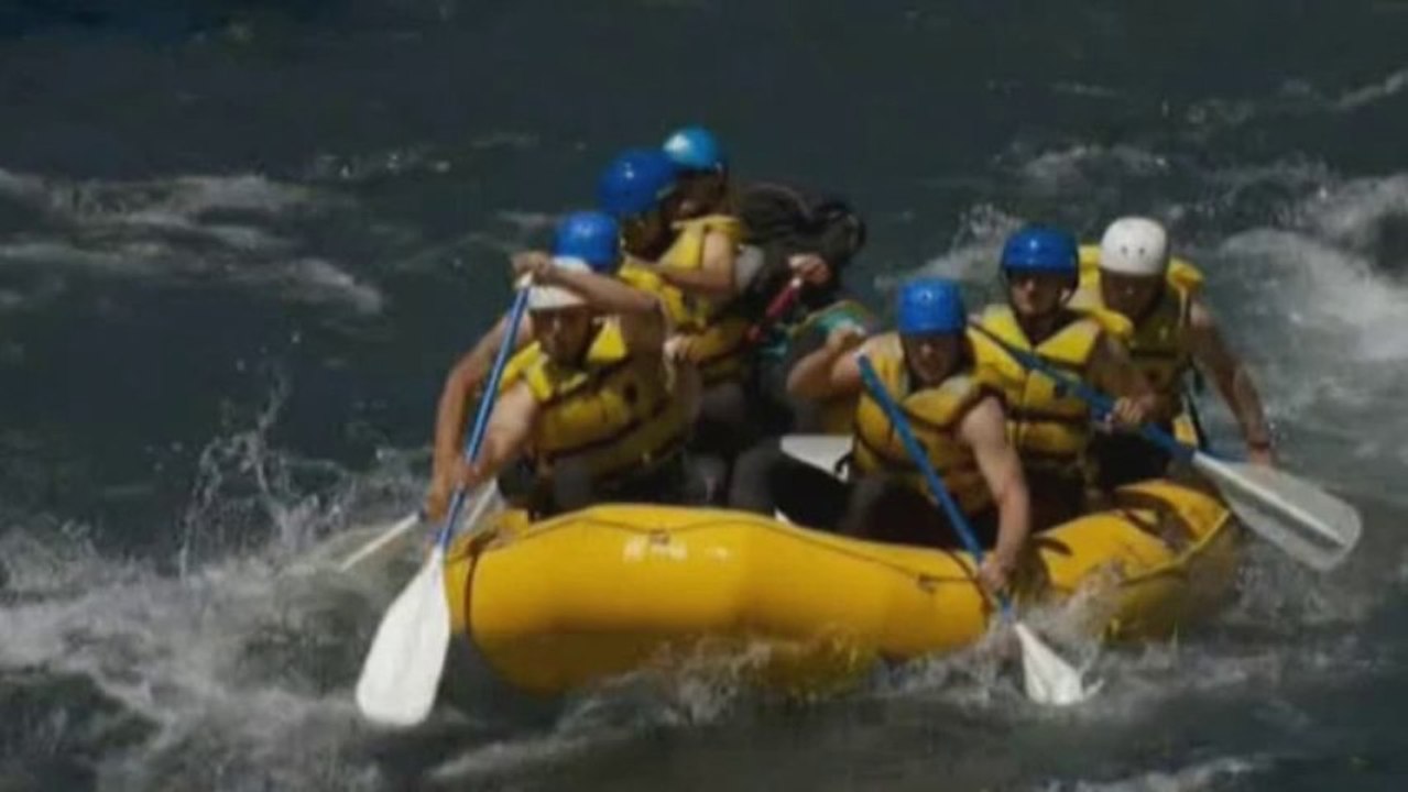 Rafter knocked out in rapids saved