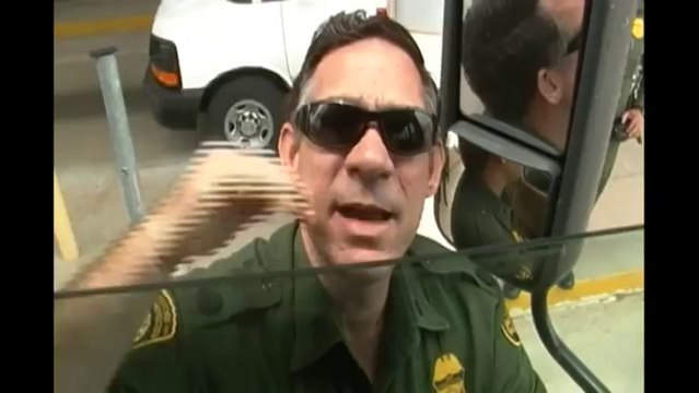 Cop at Suspicionless Checkpoint Starts Barking Orders, But Then Flees from Camera