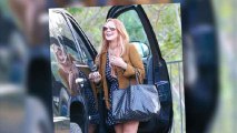 Lindsay Lohan Leaves Rehab Happy