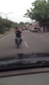 Dumb guy driving a motorcycle... And hit a car.