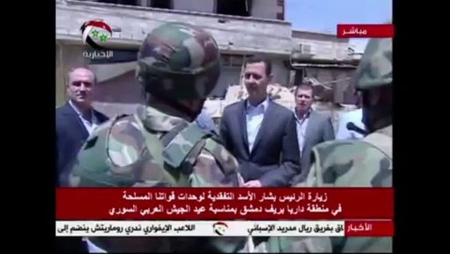 Confident of victory, Syria's Assad visits troops in Daraya