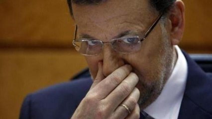 Spain PM admits mishandling funding scandal