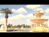 Time Lapse of Clouds moving in quick motion and Water falling from the fountain in United States
