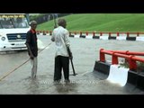 Old men try and control the traffic at Aiims flyover - Delhi Monsoons