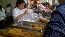Chinese women Packing Donuts so so quickly!!! Awesome