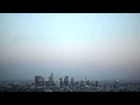 Sunset over high rise buildings in the United States - Time Lapse