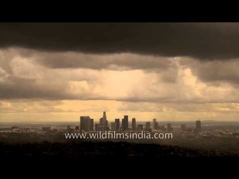 Powerful time lapse of rain clouds crossing over American city