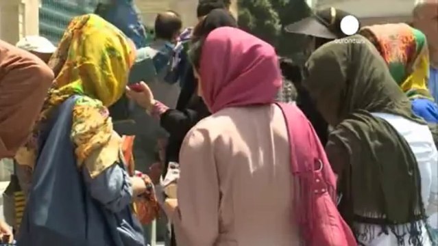 Iran's new president prepares to take over from Ahmadinejad