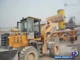 طفل يقود جرافة  a child operate a loader !