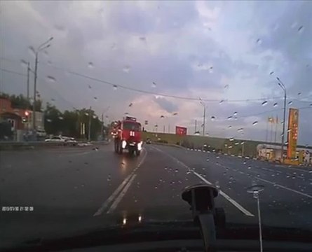 A fireman truck rushes at them at high speed. Almost dead but lucky!
