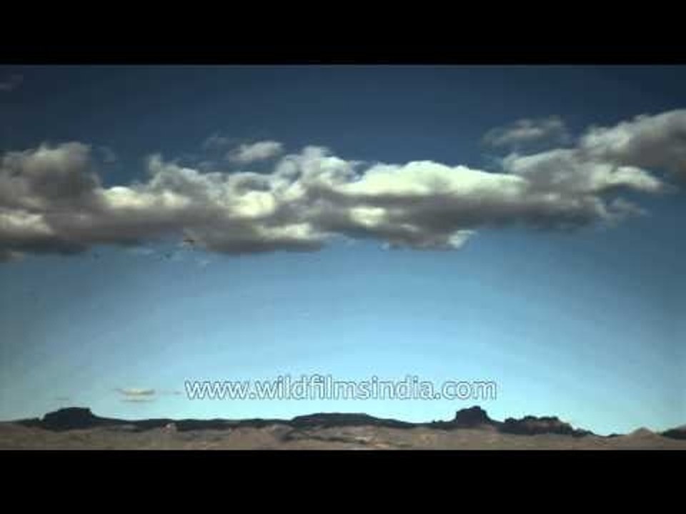 Clouds floating above blue sky