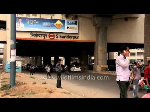 The main road outside the Sikanderpur Metro Station