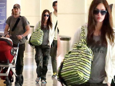 Megan Fox hides her second baby bump