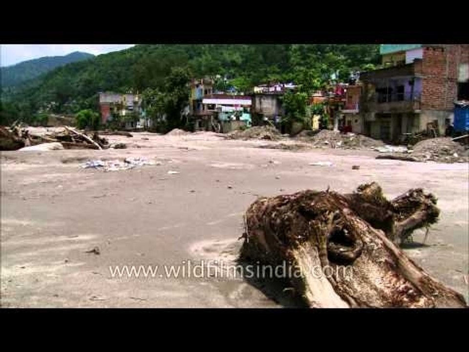 Partially damaged houses in Agustmuni after fla...