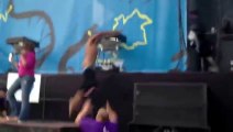 Security Guard tackles guy on stage during Vampire Weekend show in Lollapalooza festival 2013