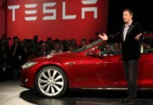 Earnings News After-Hours: Tesla Motors Inc (TSLA), Groupon Inc (GRPN)
