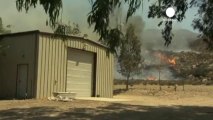 Wildfires force residents to flee in California