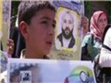 أحد عشر أسيرا فلسطينيا يواصلون إضرابهم المفتوح